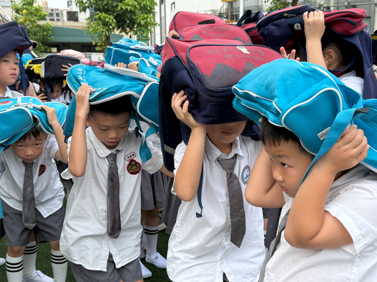 人人讲安全 个个会应急——海口市山高幼儿园2025年防震减灾演练活动-图片37